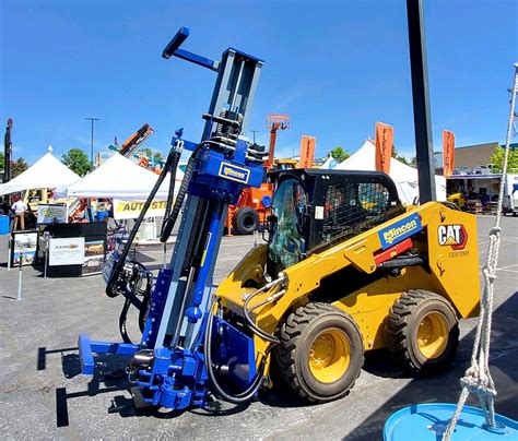 skid steer rock drill attachment